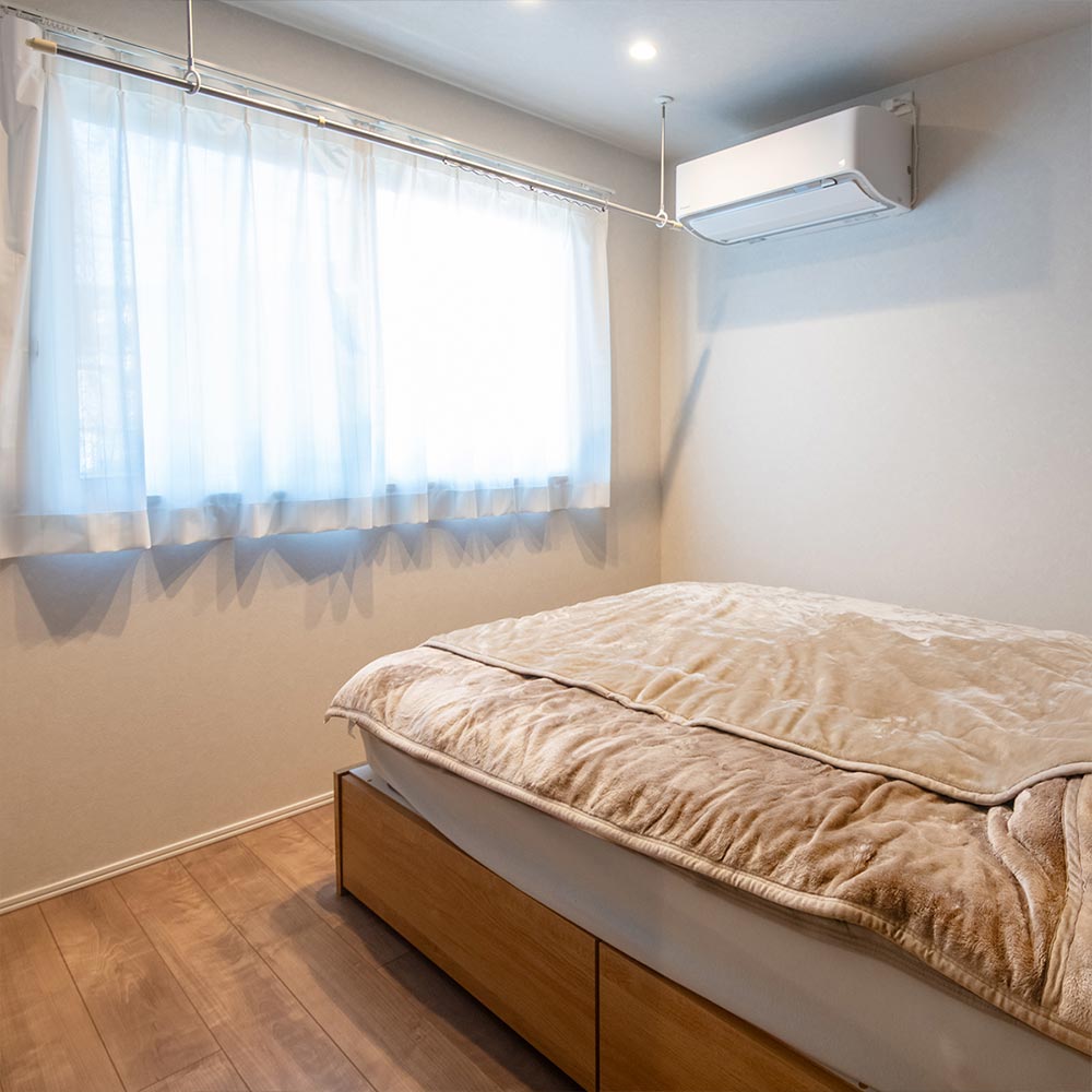 イメージ_東京セキスイハイム建築事例_室内干しポールを設けた寝室